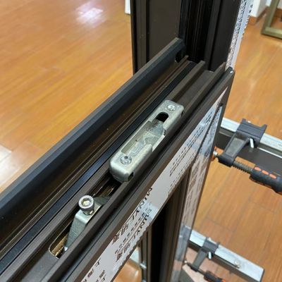 Minimalist Glass Door with Chinese Top Hardware Aluminum Double Leaf Casement Window