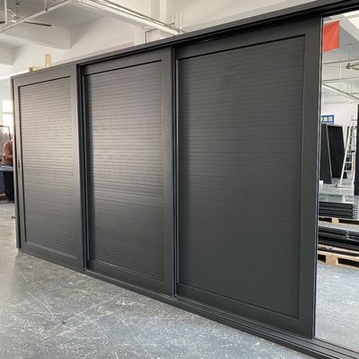 Entry Sliding Gusset Door System for Panoramic Corner Patio Doors Finished in Aluminum
